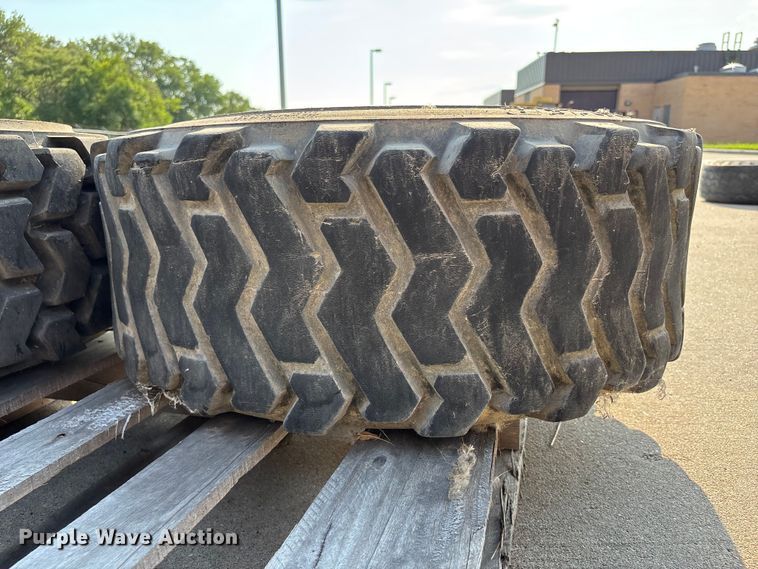 image for item NM9922 (4) 12-16.5 tires and wheels