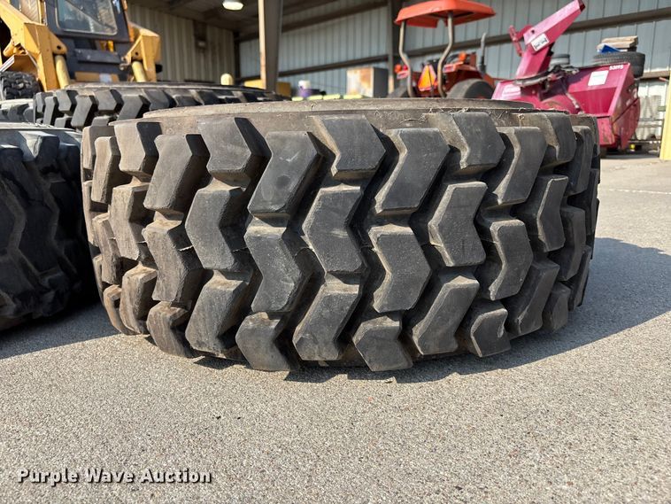 image for item NM9922 (4) 12-16.5 tires and wheels