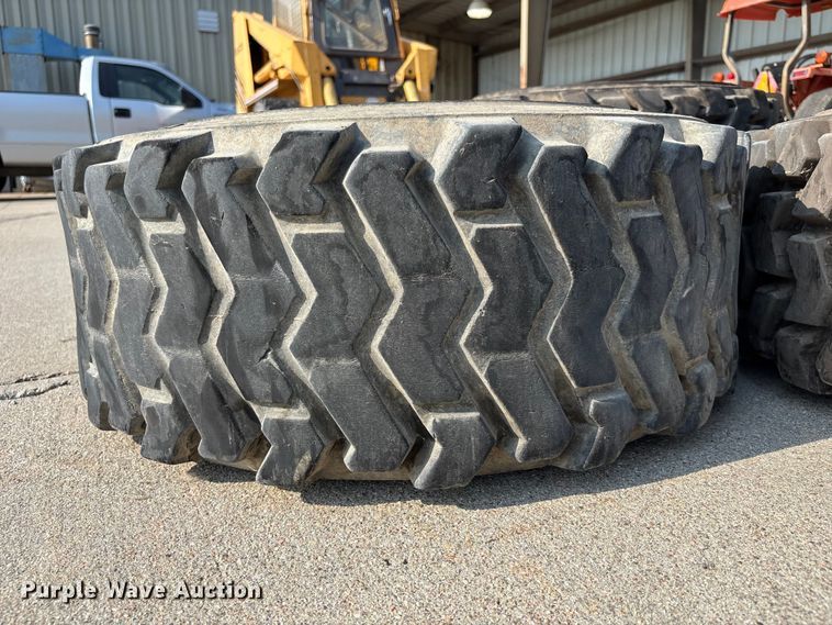 image for item NM9922 (4) 12-16.5 tires and wheels