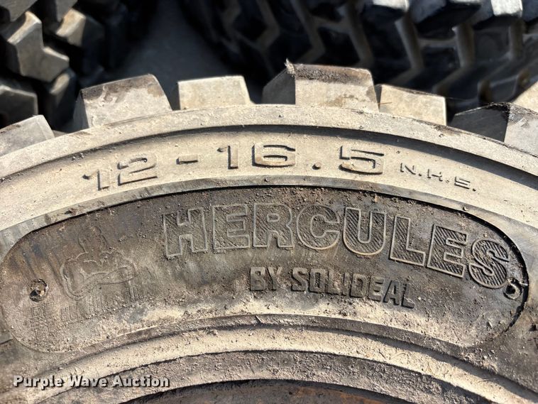 image for item NM9922 (4) 12-16.5 tires and wheels
