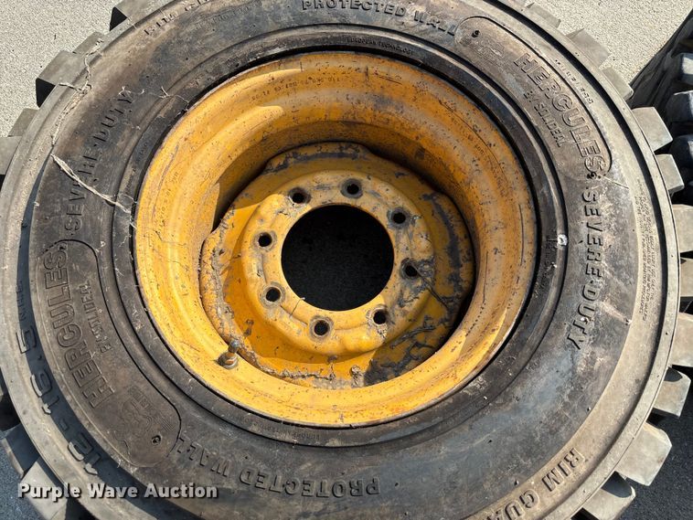 image for item NM9922 (4) 12-16.5 tires and wheels