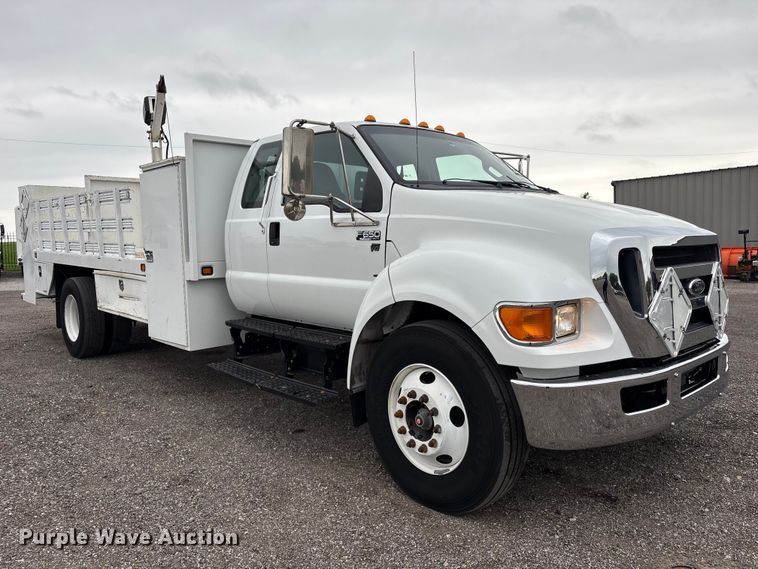 image for item EG9204 2015 Ford F650 Super Duty Ext. Cab flatbed truck