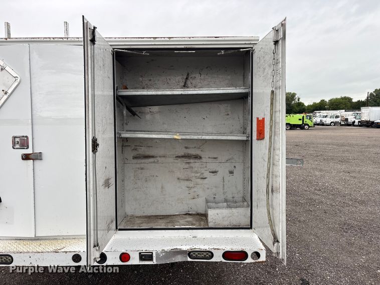 image for item EG9204 2015 Ford F650 Super Duty Ext. Cab flatbed truck
