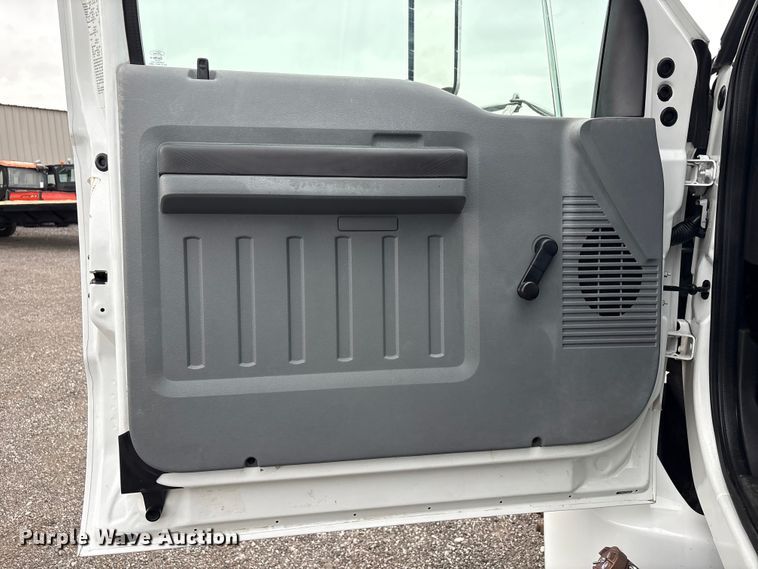 image for item EG9204 2015 Ford F650 Super Duty Ext. Cab flatbed truck