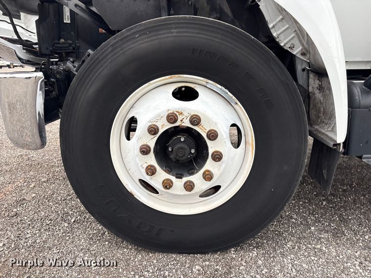 image for item EG9204 2015 Ford F650 Super Duty Ext. Cab flatbed truck