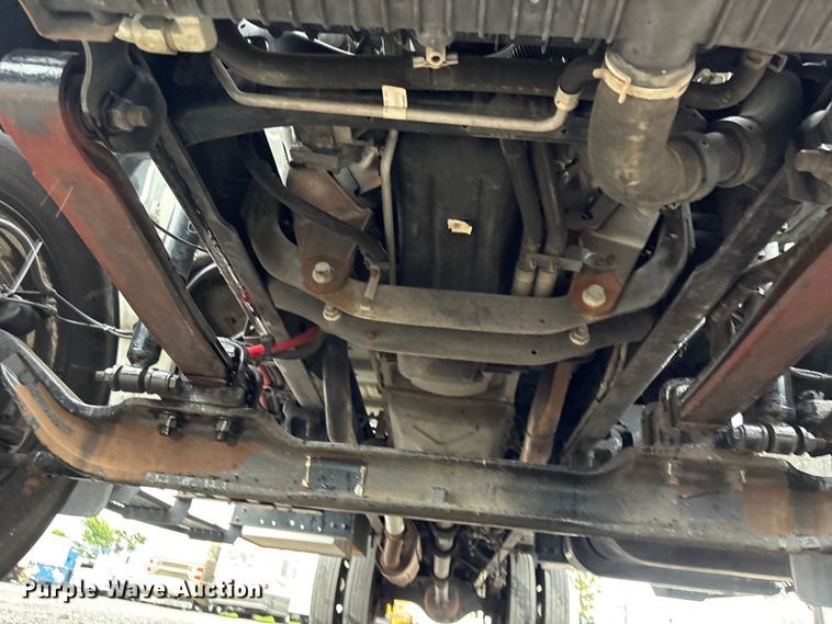 image for item EG9204 2015 Ford F650 Super Duty Ext. Cab flatbed truck