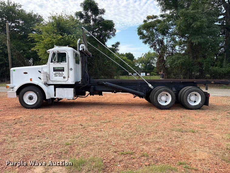 image for item ET0351 1993 Peterbilt 357 roll-off container truck