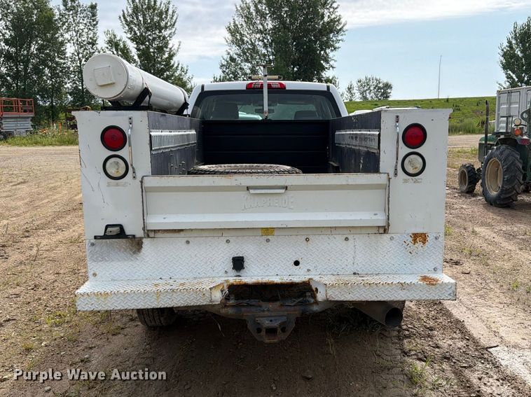 image for item FB5894 2015 GMC Sierra 2500HD Ext. Cab utility bed pickup truck