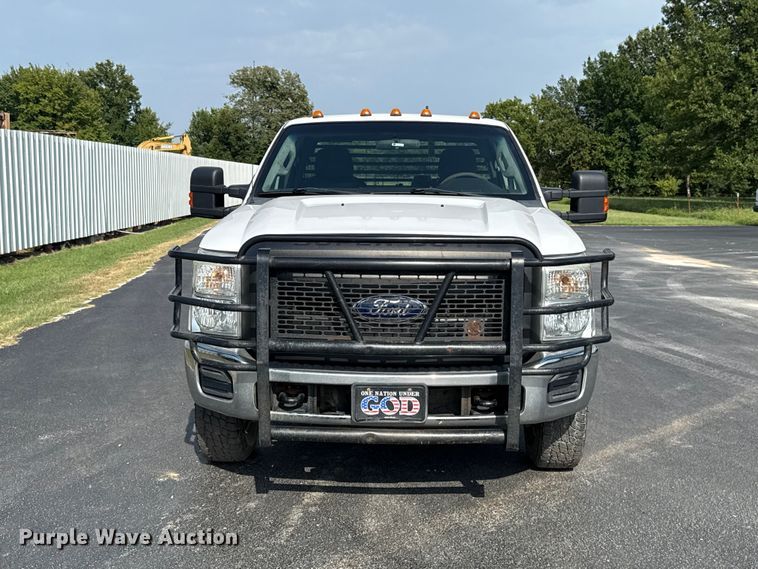 image for item FC4121 2011 Ford F350 Ext. Cab flatbed pickup truck