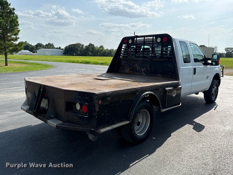 image for item FC4121 2011 Ford F350 Ext. Cab flatbed pickup truck