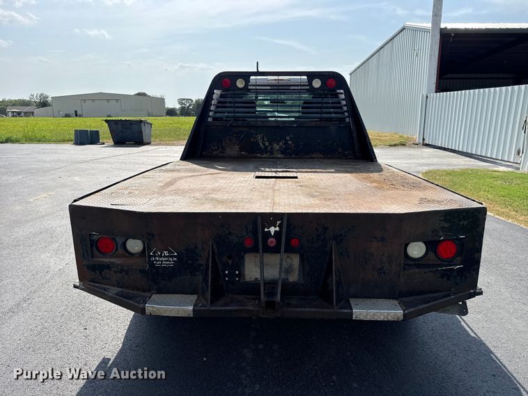 image for item FC4121 2011 Ford F350 Ext. Cab flatbed pickup truck