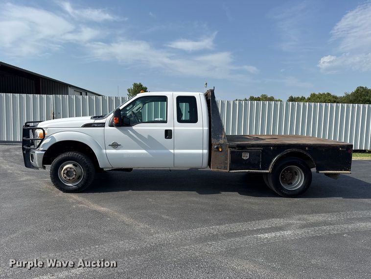 image for item FC4121 2011 Ford F350 Ext. Cab flatbed pickup truck