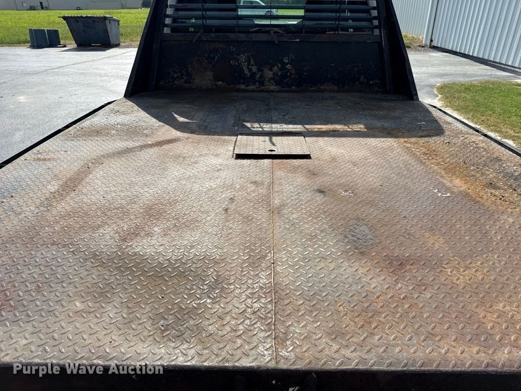 image for item FC4121 2011 Ford F350 Ext. Cab flatbed pickup truck