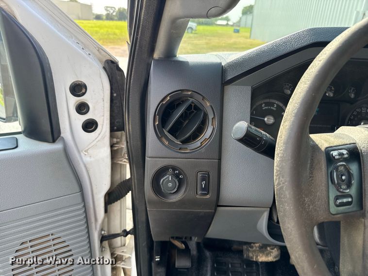 image for item FC4121 2011 Ford F350 Ext. Cab flatbed pickup truck