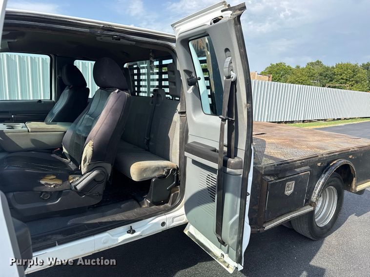 image for item FC4121 2011 Ford F350 Ext. Cab flatbed pickup truck