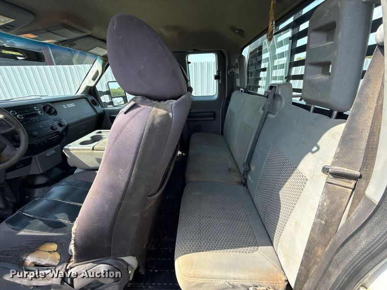 image for item FC4121 2011 Ford F350 Ext. Cab flatbed pickup truck