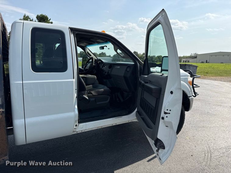 image for item FC4121 2011 Ford F350 Ext. Cab flatbed pickup truck