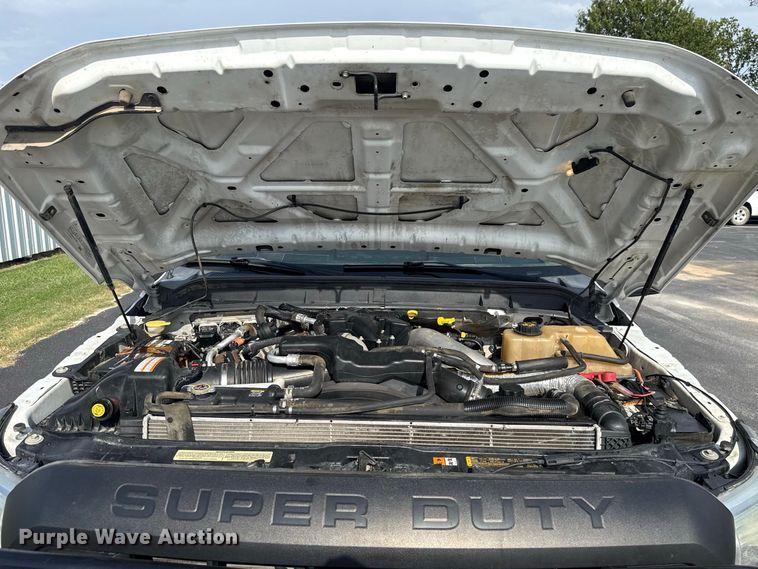 image for item FC4121 2011 Ford F350 Ext. Cab flatbed pickup truck