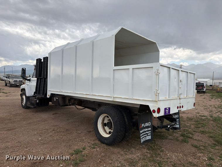 image for item FM7618 2007 GMC C7500 chipper truck