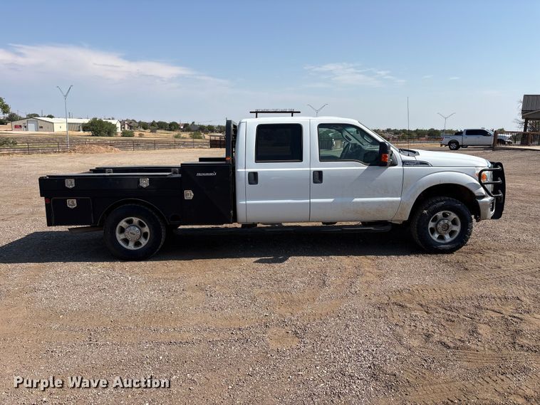 image for item JM9419 2015 Ford F250 Super Duty Crew Cab flatbed pickup truck