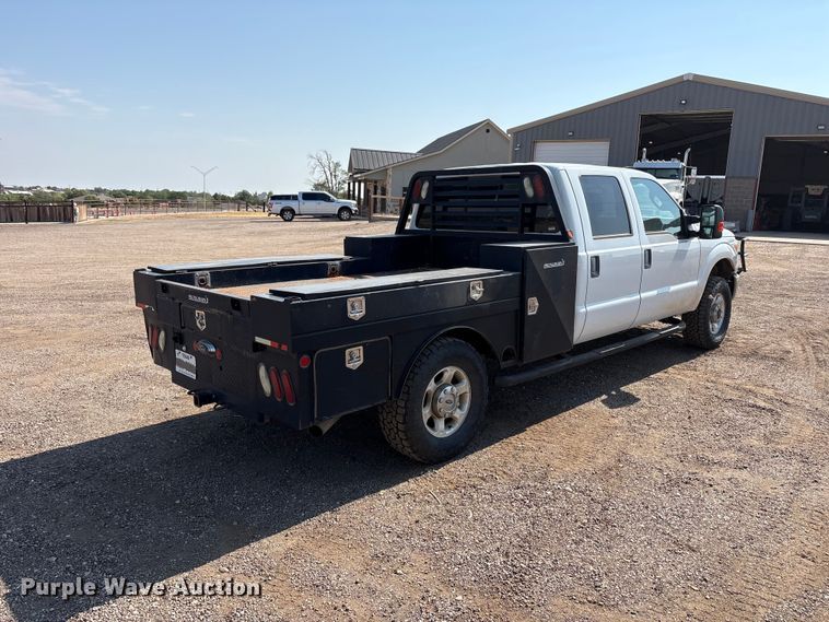 image for item JM9419 2015 Ford F250 Super Duty Crew Cab flatbed pickup truck