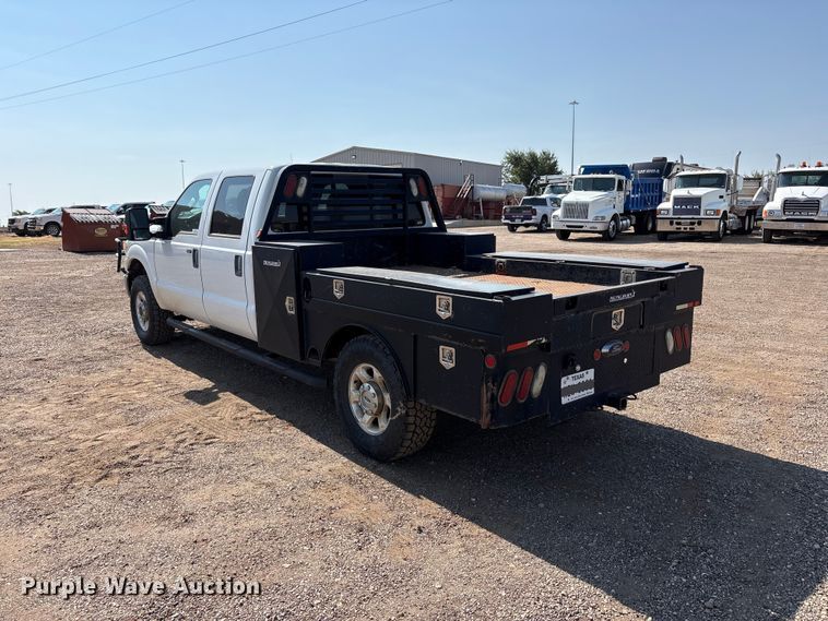image for item JM9419 2015 Ford F250 Super Duty Crew Cab flatbed pickup truck