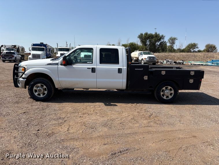 image for item JM9419 2015 Ford F250 Super Duty Crew Cab flatbed pickup truck
