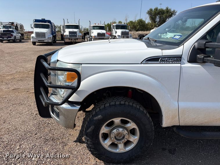 image for item JM9419 2015 Ford F250 Super Duty Crew Cab flatbed pickup truck