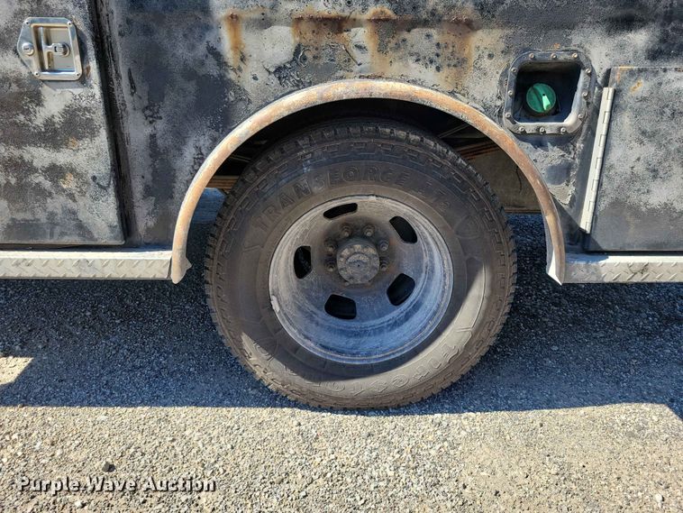 image for item DZ7275 2014 Dodge 3500 Crew Cab flatbed pickup truck
