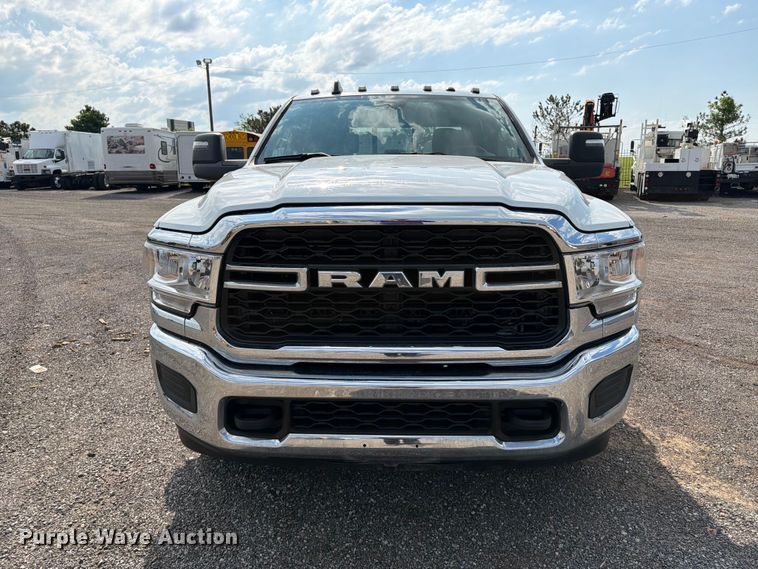 image for item EG9273 2024 RAM 3500 Heavy Duty Crew Cab utility bed pickup truck