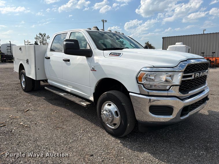 image for item EG9273 2024 RAM 3500 Heavy Duty Crew Cab utility bed pickup truck