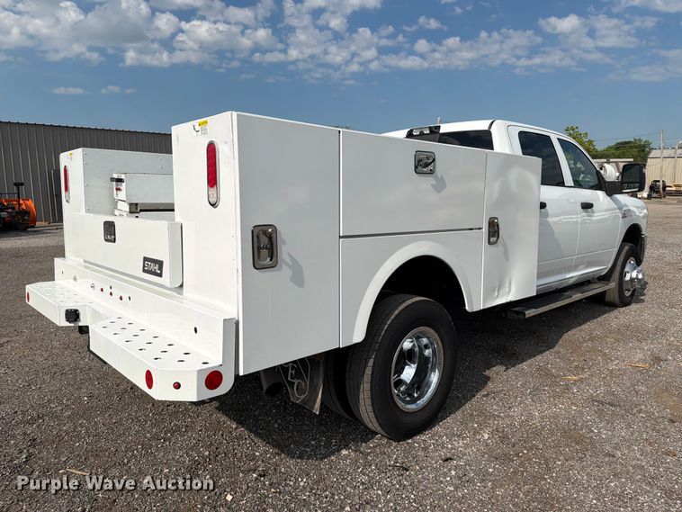 image for item EG9273 2024 RAM 3500 Heavy Duty Crew Cab utility bed pickup truck