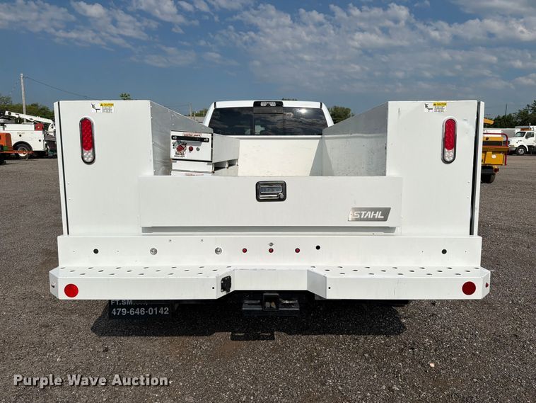image for item EG9273 2024 RAM 3500 Heavy Duty Crew Cab utility bed pickup truck