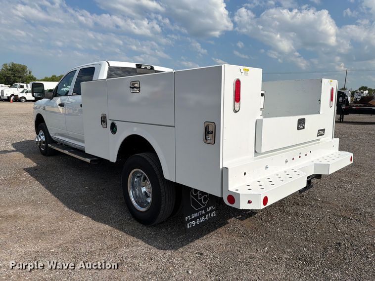 image for item EG9273 2024 RAM 3500 Heavy Duty Crew Cab utility bed pickup truck