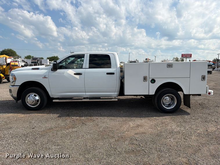 image for item EG9273 2024 RAM 3500 Heavy Duty Crew Cab utility bed pickup truck