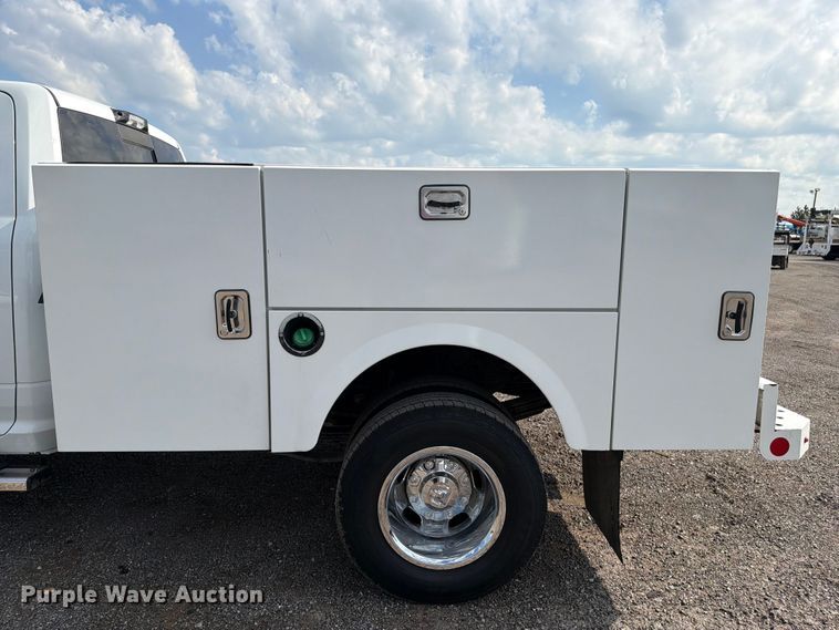 image for item EG9273 2024 RAM 3500 Heavy Duty Crew Cab utility bed pickup truck