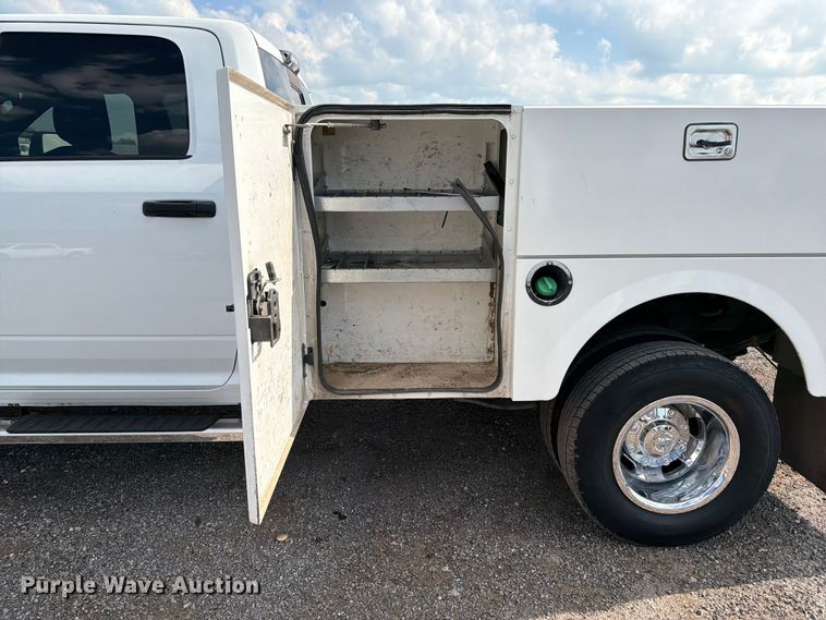 image for item EG9273 2024 RAM 3500 Heavy Duty Crew Cab utility bed pickup truck