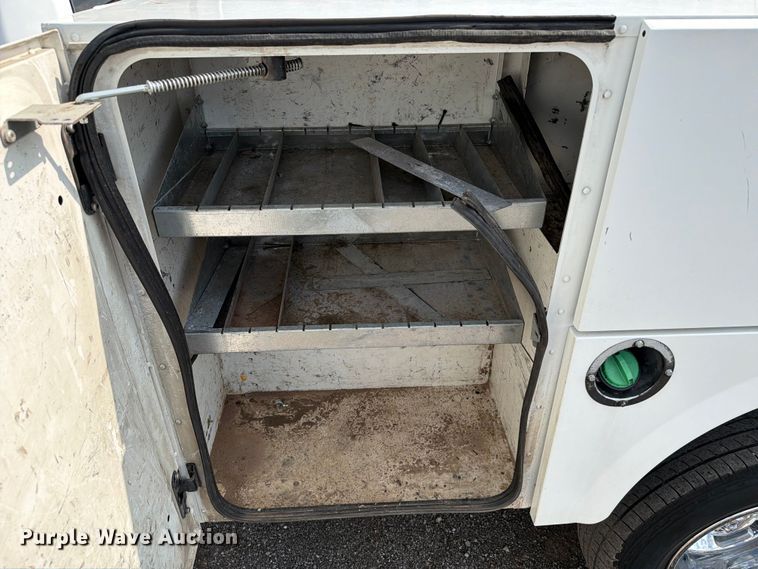 image for item EG9273 2024 RAM 3500 Heavy Duty Crew Cab utility bed pickup truck