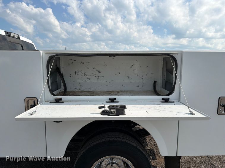 image for item EG9273 2024 RAM 3500 Heavy Duty Crew Cab utility bed pickup truck