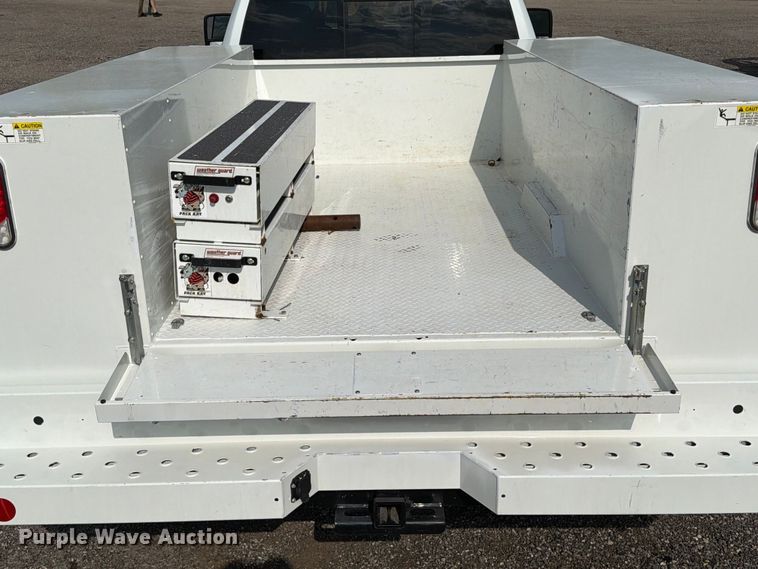 image for item EG9273 2024 RAM 3500 Heavy Duty Crew Cab utility bed pickup truck