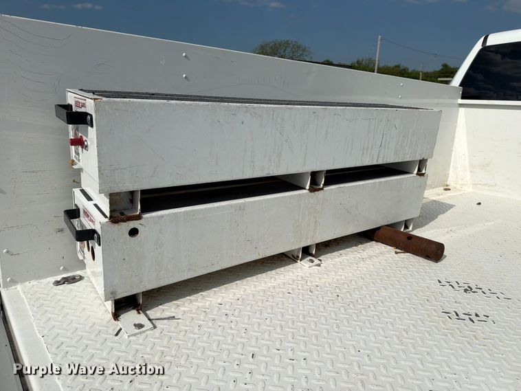image for item EG9273 2024 RAM 3500 Heavy Duty Crew Cab utility bed pickup truck