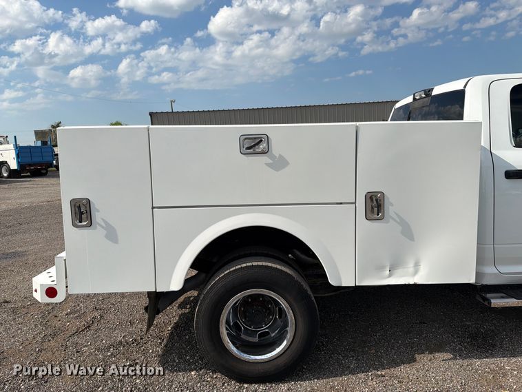 image for item EG9273 2024 RAM 3500 Heavy Duty Crew Cab utility bed pickup truck