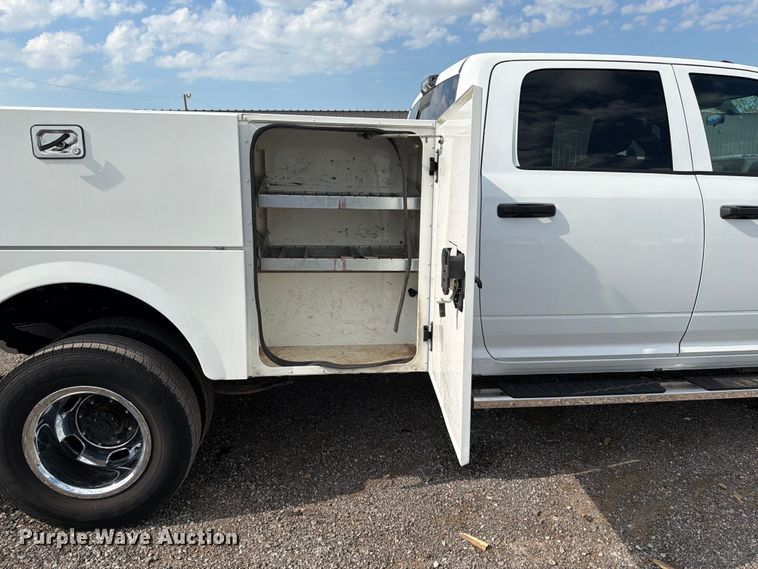 image for item EG9273 2024 RAM 3500 Heavy Duty Crew Cab utility bed pickup truck