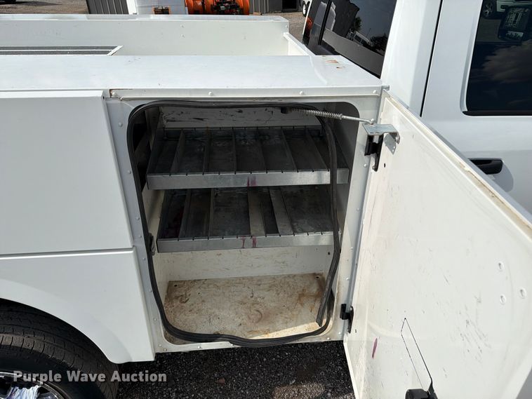 image for item EG9273 2024 RAM 3500 Heavy Duty Crew Cab utility bed pickup truck