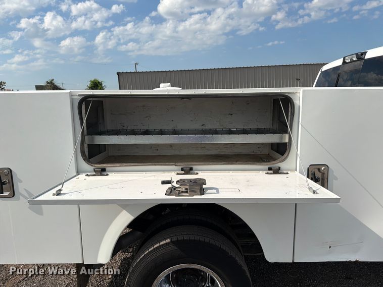 image for item EG9273 2024 RAM 3500 Heavy Duty Crew Cab utility bed pickup truck
