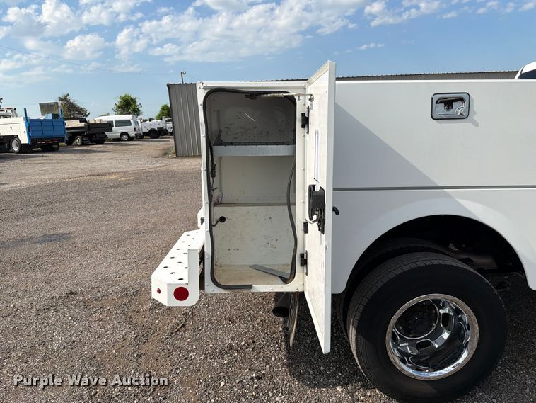 image for item EG9273 2024 RAM 3500 Heavy Duty Crew Cab utility bed pickup truck