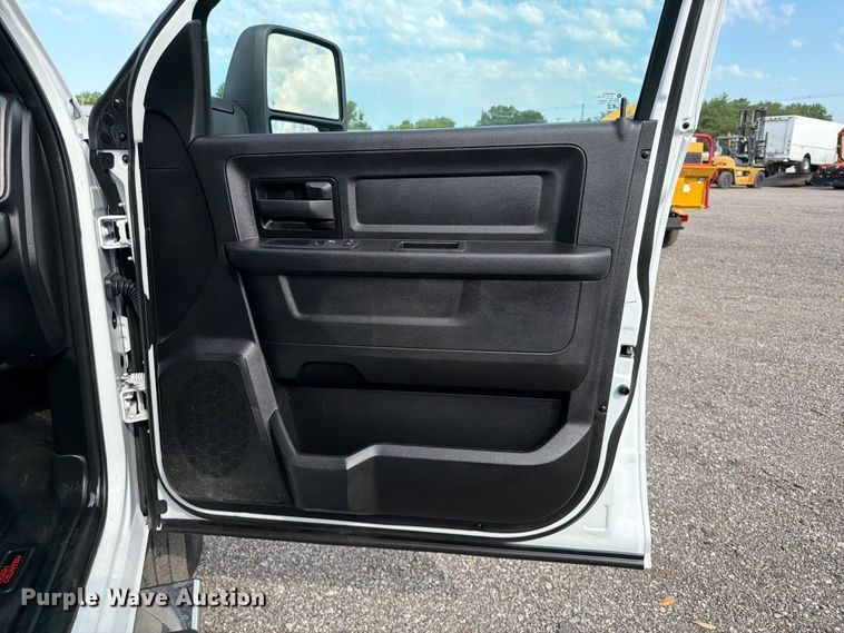 image for item EG9273 2024 RAM 3500 Heavy Duty Crew Cab utility bed pickup truck