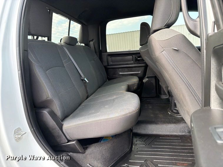 image for item EG9273 2024 RAM 3500 Heavy Duty Crew Cab utility bed pickup truck