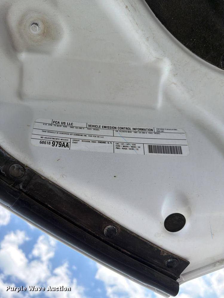 image for item EG9273 2024 RAM 3500 Heavy Duty Crew Cab utility bed pickup truck