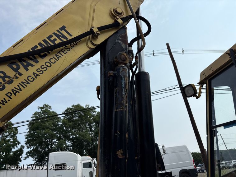 image for item ET8662 1989 Caterpillar 428 backhoe